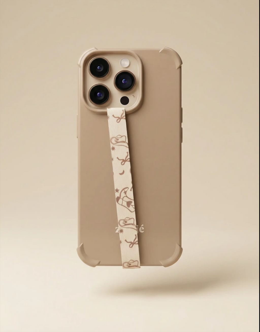 Velnoon Boots & Bows phone lanyard strap with bow pattern for attaching to a smartphone case