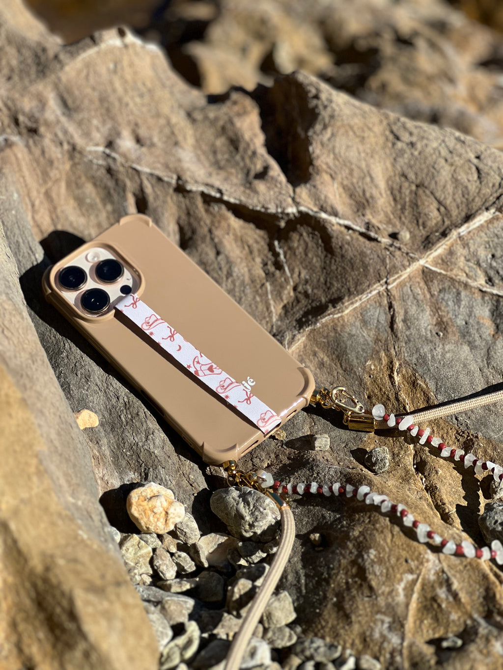 Velnoon phone strap met Boots & Bows design als stijlvol fashion accessoire